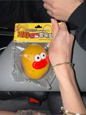 Yellow Potato Squeeze Toy with Red Mouth and Eyes - Kids Learning Toy
